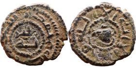 Umayyad/Abbasid. Bronze coin. Obverse: Arabic inscription. Reverse: Arabic inscription

Weight:17mm 2,46g