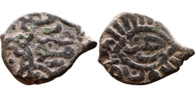 Umayyad/Abbasid. Bronze coin. Obverse: Arabic inscription. Reverse: Arabic inscription

Weight:19mm 2,07g