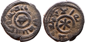 Umayyad/Abbasid. Bronze coin. Obverse: Arabic inscription. Reverse: Arabic inscription

Weight:16mm 2,37g

Artificial sand patina