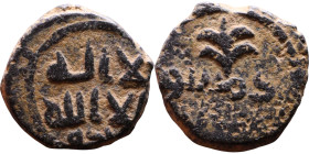 Umayyad/Abbasid. Bronze coin. Obverse: Arabic inscription. Reverse: Arabic inscription

Weight:15mm 3,28g

Artificial sand patina