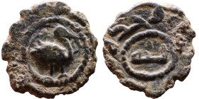 Umayyad/Abbasid. Bronze coin. Obverse: Arabic inscription. Reverse: Arabic inscription

Weight:14mm 1,86g