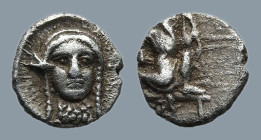 PERSIA. Achaemenid Empire. Uncertain mint in Cilicia. (4th century BC)
AR Tetartemorion (5,4mm 0,14g)
Obv: Persian king or hero in kneeling-running ...