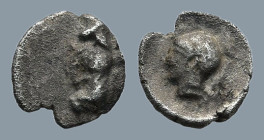 ACHAEMENID EMPIRE. Uncertain mint in Cilicia. (4th century BC)
AR Tetartemorion (5,7mm 0,15g)
Obv: Persian king or hero in kneeling-running stance t...