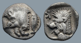 MYSIA. Kyzikos. (Circa 450-400 BC)
AR Obol (9,2mm 0,8g)
Obv: Forepart of boar left; tunny to right.
Rev: Head of roaring lion left; retrograde K in...