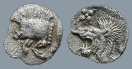 MYSIA. Kyzikos. (Circa 450-400 BC).
AR Hemiobol (8,9mm 0,24g)
Obv: Forepart of boar left; to right, tunny upward.
Rev: Head of roaring lion left; s...
