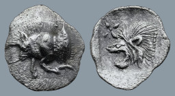 MYSIA. Kyzikos. (Circa 450-400 BC).
AR Hemiobol (9,3mm 0,36g)
Obv: Forepart of boar left; to right, tunny upward.
Rev: Head of roaring lion left; s...