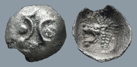 MYSIA. Kyzikos. (450-400 BC)
AR Tetartemorion (6,8mm 0,10g)
Obv: Crescents in triangular arrangement, pellet in one and between two
Rev: Head of ro...