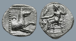 LYCAONIA. Laranda. (Circa 324/3 BC)
AR Obol (10,2mm 0,6g)
Obv: Baaltars seated left, holding grain ear and grape bunch in his right hand and scepter...