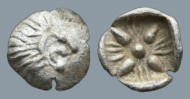 IONIA. Miletos. (Late 6th-early 5th century BC).
AR Tetartemorion(6,7mm 0,13g)
Obv: Head of a roaring lion rigth.
Rev: Floral or stellar pattern wi...