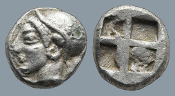 IONIA. Phokaia. (Circa 521-478 BC).
AR Obol (8mm 0,64g)
Obv: Archaic female head left, wearing earring and helmet or close fitting cap.
Rev: Quadri...
