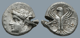 PAPHLAGONIA. Sinope. (3rd century BC)
AR Hemidrachm (15,3mm 2,7g)
Obv: Head of nymph left, hair in sakkos
Rev: ΣI-NΩ. Eagle facing, head left, wing...