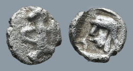 CILICIA. Uncertain. (4th century BC).
AR Tetartemorion (5,2mm 0,13g)
Obv: Persian king or hero in kneeling-running stance right, holding dagger and ...