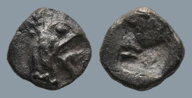 IONIA. Teos. (Circa 475-450 BC)
AR Hemiobol (6,8mm 0,3g)
Obv: Head of griffin right.
Rev: Quadripartite incuse square.
SNG Kayhan 603 var.(tetarte...