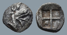 IONIA. Teos. (Circa 475-450 BC).
AR Tetartemorion (6,5mm 0,21g)
Obv: Head of griffin right
Rev: Quadripartite incuse square.
SNG Kayhan 603