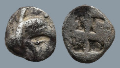 IONIA. Teos. (Circa 475-450 BC).
AR Tetartemorion (6,2mm 0,26g)
Obv: Head of griffin right
Rev: Quadripartite incuse square.
SNG Kayhan 603
