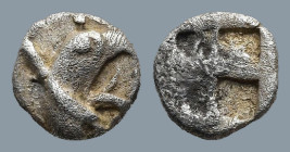 IONIA. Teos. (Circa 475-450 BC).
AR Tetartemorion (5,8mm 0,21g)
Obv: Head of griffin right
Rev: Quadripartite incuse square.
SNG Kayhan 603
