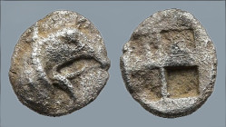 IONIA. Teos. (Circa 475-450 BC).
AR Tetartemorion (5,7mm 0,15g)
Obv: Head of griffin right
Rev: Quadripartite incuse square.
SNG Kayhan 603