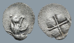 IONIA. Teos. (Circa 475-450 BC).
AR Tetartemorion (7,5mm 0,12g)
Obv: Head of griffin right
Rev: Quadripartite incuse square.
SNG Kayhan 603