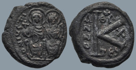 Justin II with Sophia (565-578 AD). Thessalonica
AE Half Follis (21,5mm 5,2g)
Obv: Justin, holding globus cruciger, and Sophia, holding cruciform sc...