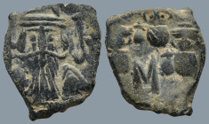 Constans II, with Constantine IV, Heraclius, and Tiberius (641-668 AD). Constantinople
AE Follis (18,9mm 4,4g)
Obv: Bust of Constans facing with lon...