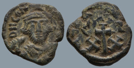 Constans II (AD 641-668 )
AE Half Follis (21,2mm, 4.6g)
Obv: Crowned bust facing holding mappa and orb.
Rev: Large cross between C and T, XX below....
