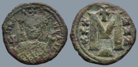 Irene (797-802 AD). Constantinople
AE Follis (28,2mm 4,5g)
Obv: ЄIRInH bAS' Crowned facing bust of Irene, wearing loros, holding globus cruciger in ...