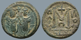 Umayyad Caliphate. temp. Mu'awiya I ibn Abi Sufyan (AH 41-60 / AD 661-680). Arab-Byzantine type, Ba'albakk (Heliopolis).
AE Fals (19,7mm 4,5g )
Obv:...