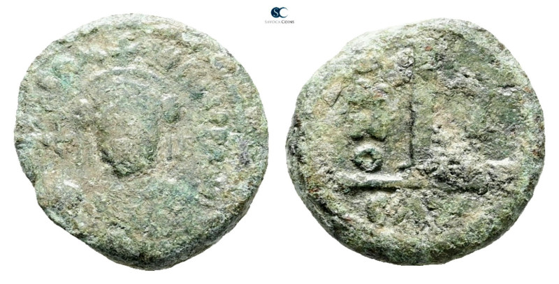 Justinian I AD 527-565. Catania
Decanummium Æ

16 mm, 3,40 g



Fine