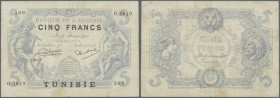 Algeria: 5 Francs 1925 P. 1, center fold, staining at lower broder, probably pressed, no holes or tears, still strong paper, condition: F+.
