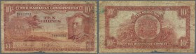 Bahamas: 10 Shillings ND(1930) P. 6, stronger used with a small missing part at lower border, lots of stain and already some softness in paper, no hol...