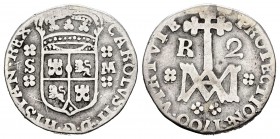 Carlos II (1665-1700). 2 reales. 1700. Sevilla. M. (Cal-655). Ag. 4,09 g. Tipo María. Sin gráfila interior en reverso. Muy rara. MBC-. Est...400,00. ...