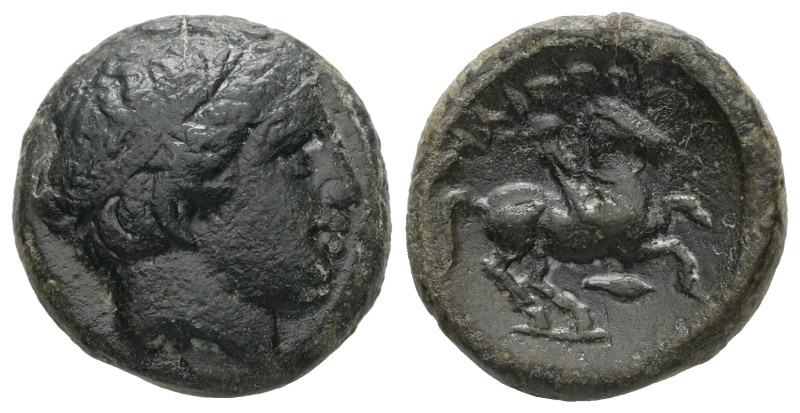 Kings of Macedon, Philip II. 359-336 BC. AE. 5.08 g. - 17.49 mm. 
Obv.: Diademed...