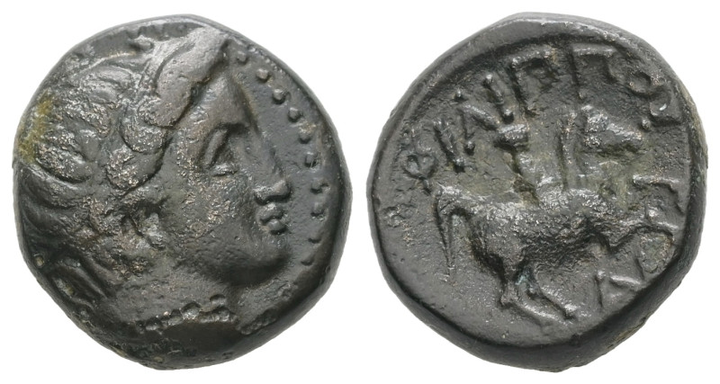 Kings of Macedon, Philip II. 359-336 BC. AE. 5.77 g. - 16.10 mm. 
Obv.: Diademed...