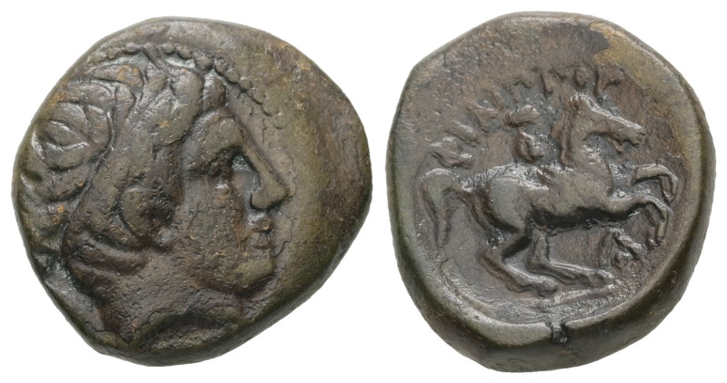 Kings Of Macedon, Philip II. 359-336 BC. AE. 6.02 g. - 18.11 mm.
Obv: Diademed h...