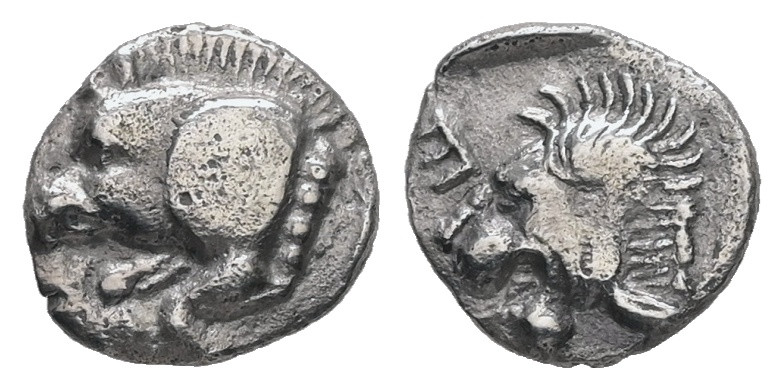 Mysia, Kyzikos. AR Obol, 0.40 g. - 8.43 mm. Circa 450-400 BC.
Obv.: Forepart of ...