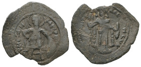 Empire of Thessalonica. John Comnenus Ducas, AD. 1237-1242. AE Trachy. 1.39 g. - 22.74 mm. Thessalonica.
Obv.: OΛΓHOC ΔHMHTPH. St. Demetrius standing ...