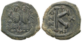 Justin II and Sophia, AD. 565-578. AE Half Follis. 7.44 g. - 24.27 mm. Nicomedia.
Obv.: DNIVSTI-NVSPPAV. Justin II on left and Sophia on right, seated...