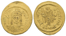 Justinian I. AD. 527-565. AV Solidus. 4.48 g. - 20.63 mm. Constantinople. 
Obv.: D N IVSTINI-ANVS P P AVG. Helmeted and cuirassed bust facing three-qu...
