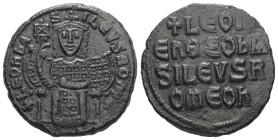 Leo VI the Wise, AD. 886-912. AE Follis. 6.64 g. - 25.43 mm. Constantinople.
Obv.: + LЄOҺЬAS-ILЄVSROM. Leo, crowned and wearing loros, seated facing o...
