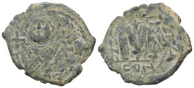 Leontius (?), AD. 695-698. AE Follis. 4.15 g. - 27.36 mm. Constantinople.
Obv.: Crowned bust facing, wearing loros and holding globus cruciger.
Rev.: ...