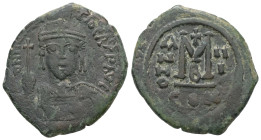 Maurice Tiberius, AD. 582-602. AE Follis. 11.14 g. - 29.64 mm. Constantinople.
Obv.: DN M[AVRIC] TIBER PP AVC. Helmeted and cuirassed bust facing, hol...