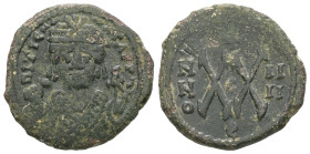 Maurice Tiberius, AD. 582-602. AE Half Follis. 5.63 g. - 23.35 mm. Theoupolis (Antioch). 
Obv.: Frontal bust of Maurice wearing loros and crown with c...