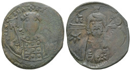 Michael VII Ducas, AD. 1071-1078. AE Follis. 5.08 g. - 26.85 mm. Constantinople.
Obv.: Frontal bust of Christ bearded, with cross behind head, wearing...