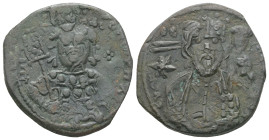 Michael VII Ducas, AD. 1071-1078. AE Follis. 5.55 g. - 26.11 mm. Constantinople.
Obv.: Frontal bust of Christ bearded, with cross behind head, wearing...