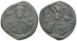 Michael VII Ducas, AD. 1071-1078. AE Follis. 7.53 g. - 28.85 mm. Constantinople.
Obv.: Frontal bust of Christ bearded, with cross behind head, wearing...