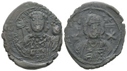 Michael VII Ducas, AD. 1071-1078. AE Follis. 7.91 g. - 28.73 mm. Constantinople.
Obv.: Frontal bust of Christ bearded, with cross behind head, wearing...
