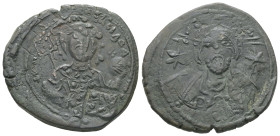 Michael VII Ducas, AD. 1071-1078. AE Follis. 9.35 g. - 29.30 mm. Constantinople.
Obv.: Frontal bust of Christ bearded, with cross behind head, wearing...