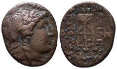 SELEUKID KINGDOM. Antiochos II Theos. 261-246 BC. Sardes. Obv: Laureate head of Apollo right. Rev: BAΣΙΛΕΩΣ ANTIOXOY Tripod. Monogram to outer left an...