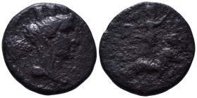 CILICIA. Tarsos. 164-27 BC. Obv: Turreted and draped bust of Tyche right. Rev: TAPΣEΩN, Sandan standing right on goat right; monogram to left. Æ 19mm,...