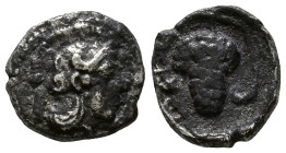 CILICIA. Soloi. Circa 350-330 BC. Obv: Head of Athena to right, wearing crested Corinthian helmet. Rev: ΣOΛEΩN Bunch of grapes on stalk with leaf and ...